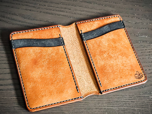 Eastland leather bifold wallet opened to show card pockets and interior organization