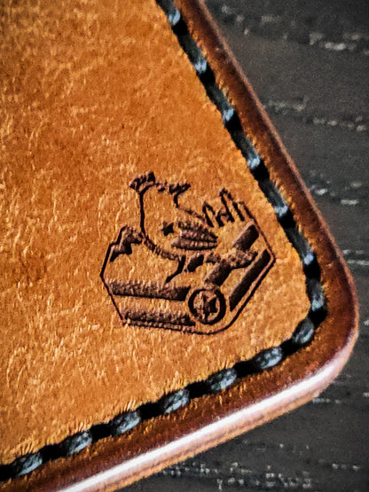 Maker's mark detail on Sidekick leather cardholder
