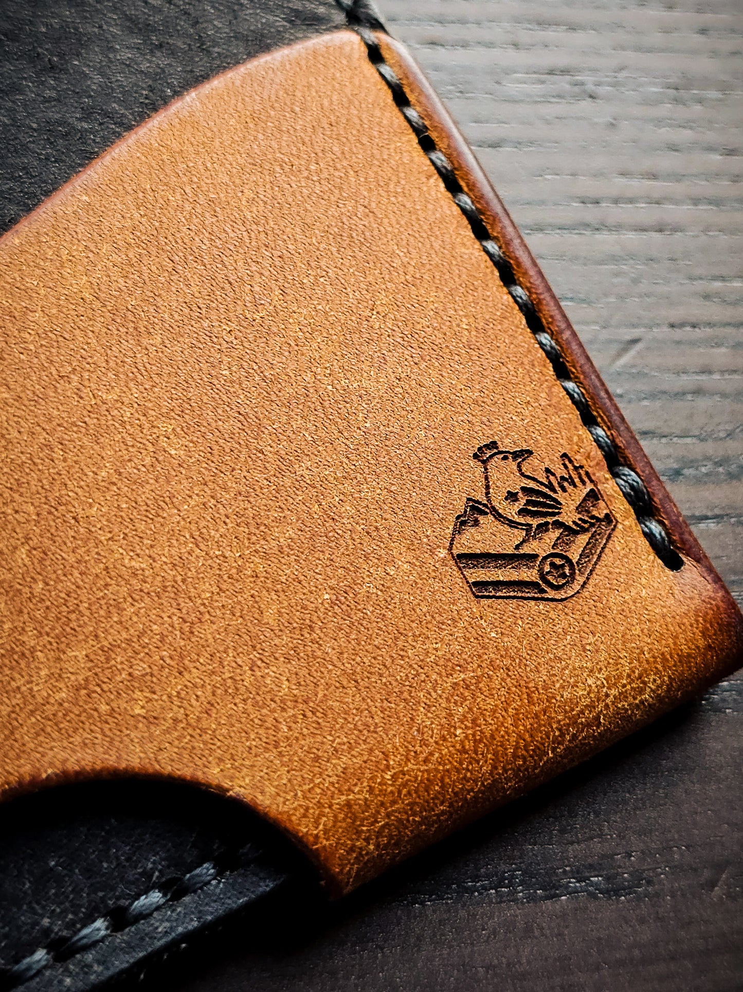 Maker's mark detail on Wingman leather cardholder
