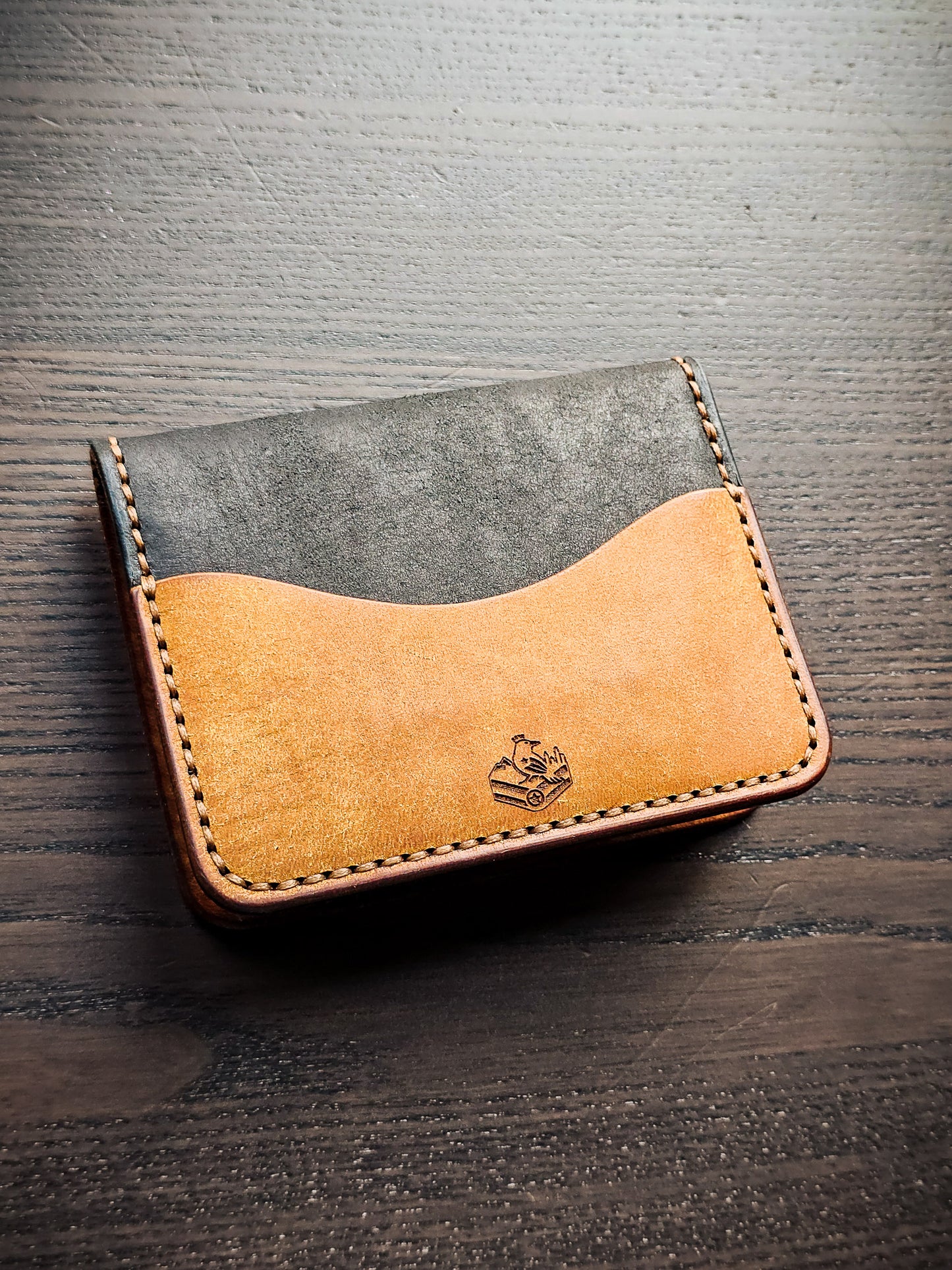 Back view of Westfield leather bifold wallet in cognac and black leather