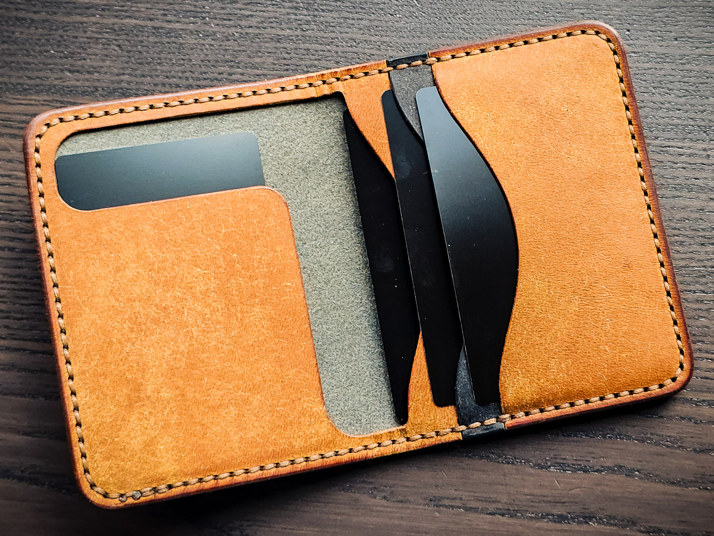 Westfield leather bifold wallet in cognac and black vegetable-tanned leather