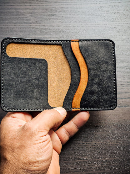Westfield leather bifold wallet shown in hand with interior card storage