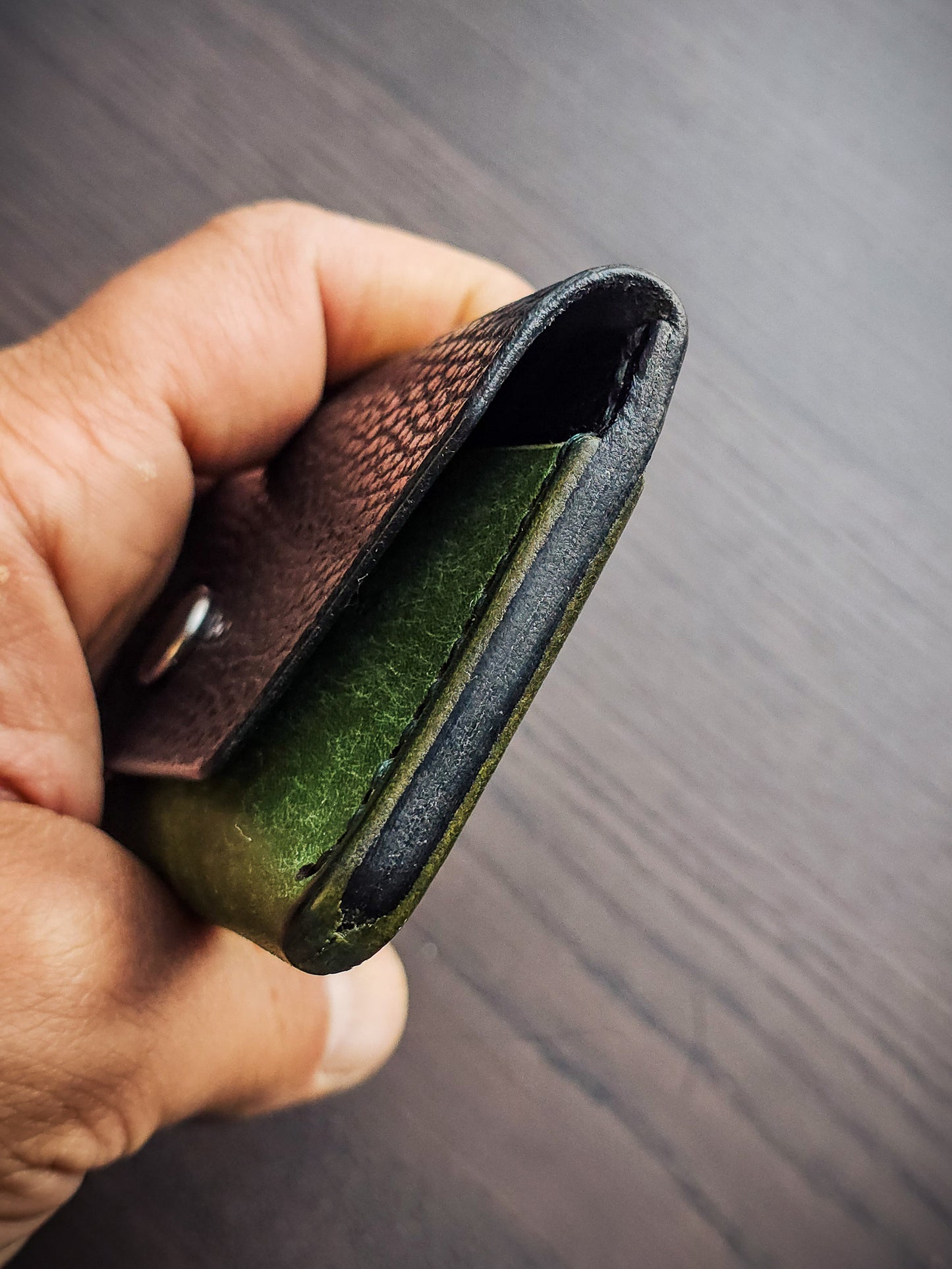 Latchkey leather keychain wallet showing compact folded profile