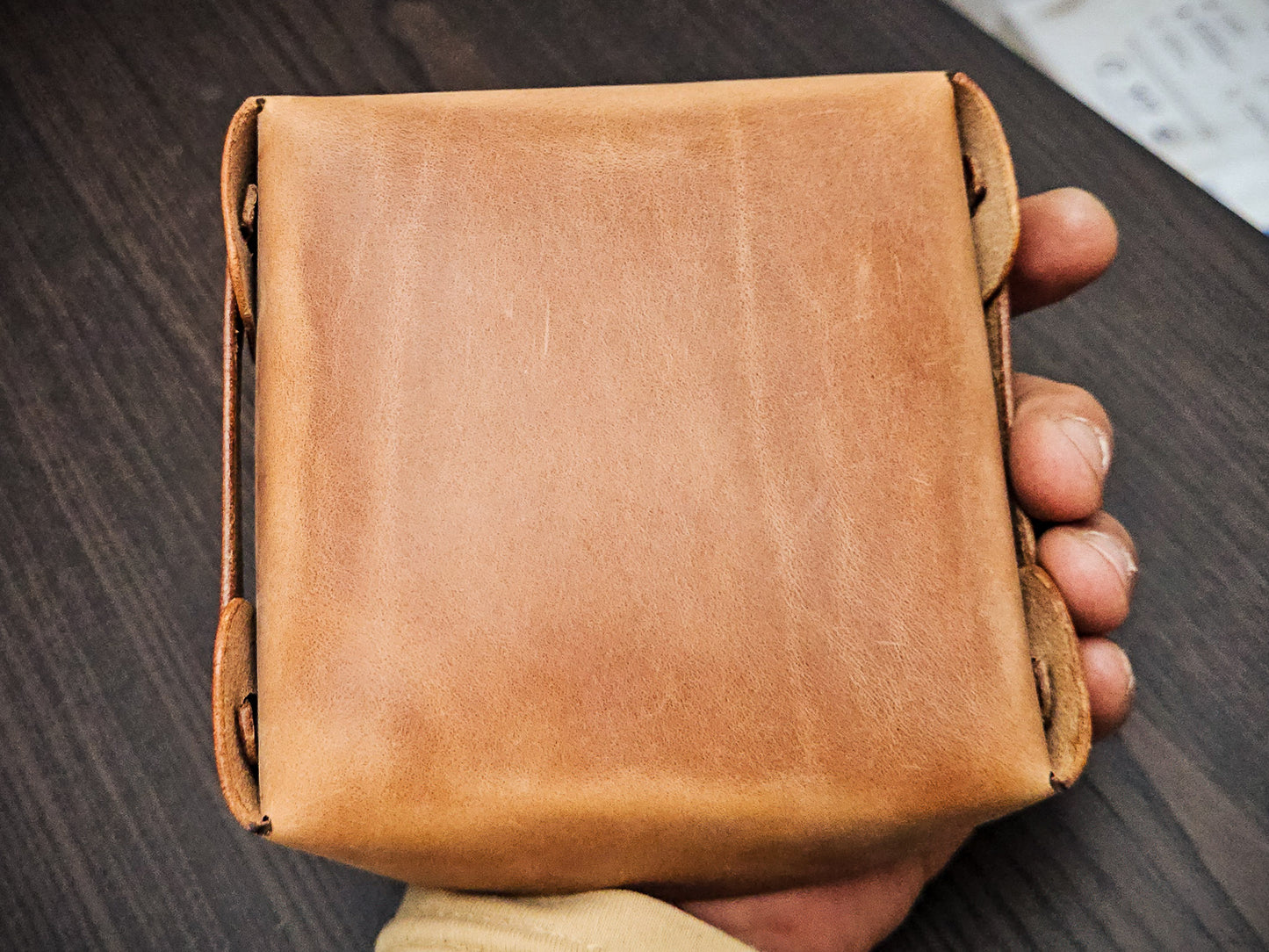 Back view of The Nest leather valet tray showing clean construction, smooth leather surface, and compact folded form.