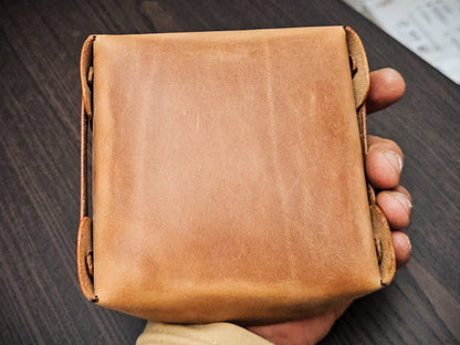 Back view of The Nest leather valet tray showing clean construction, smooth leather surface, and compact folded form.